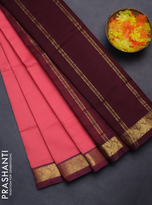 Silk cotton saree peach pink and deep maroon with plain body and zari woven border