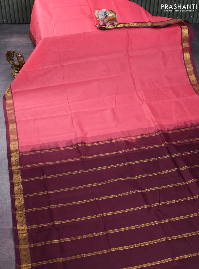 Silk cotton saree peach pink and deep maroon with plain body and zari woven border