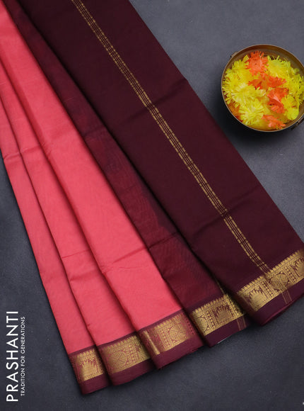 Silk cotton saree peach pink and deep maroon with plain body and zari woven border