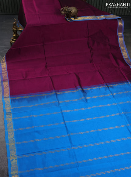 Silk cotton saree purple and cs blue with plain body and zari woven border