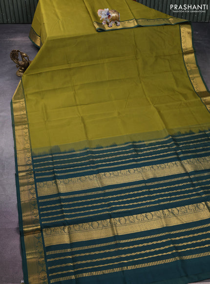Silk cotton saree mehendi green and bottle green with plain body and zari woven border