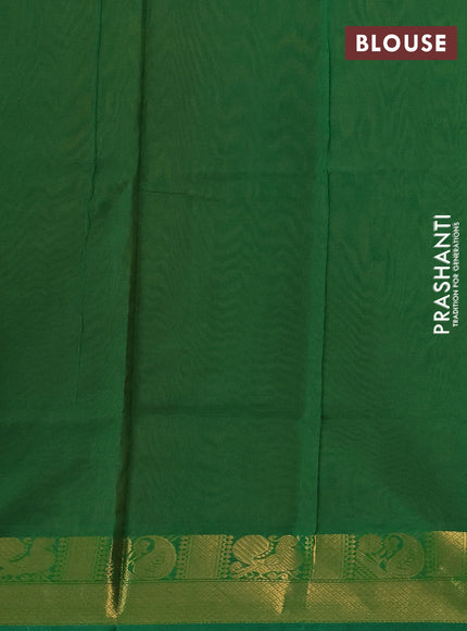 Silk cotton saree orange and green with plain body and zari woven border