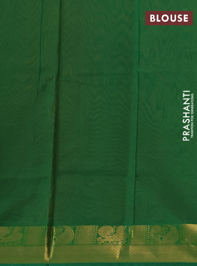 Silk cotton saree orange and green with plain body and zari woven border