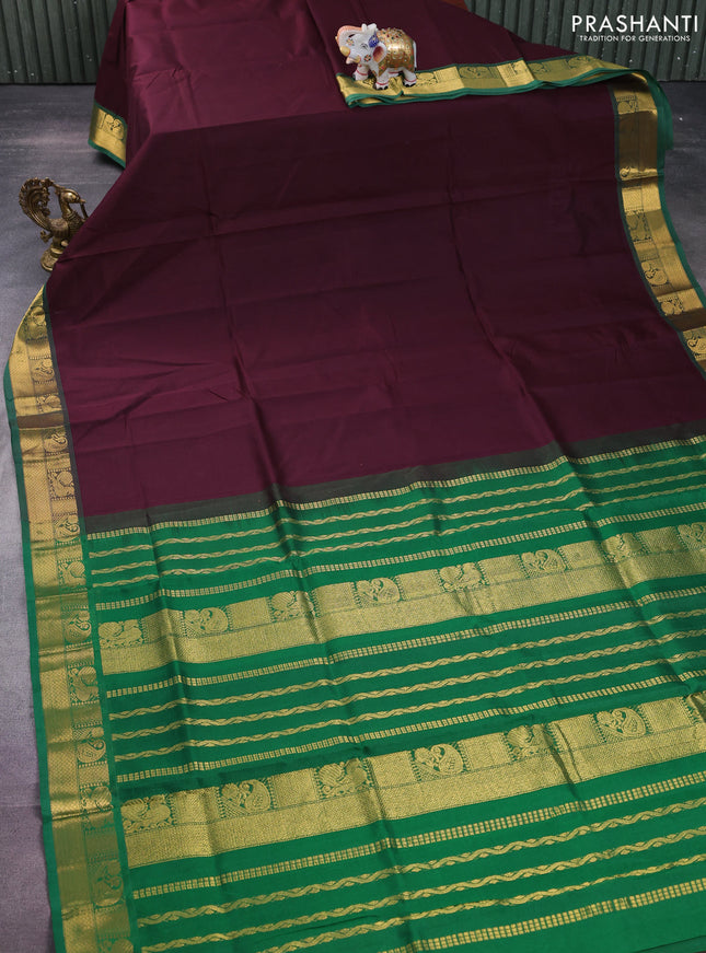 Silk cotton saree brown and green with plain body and zari woven border
