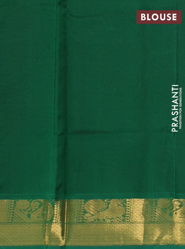 Silk cotton saree brown and green with plain body and zari woven border
