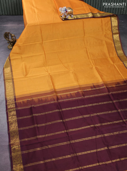 Silk cotton saree mango yellow and deep maroon with plain body and zari woven border