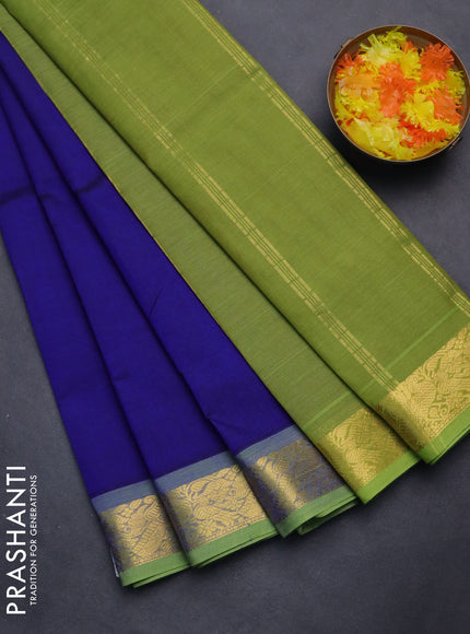 Silk cotton saree blue and light green with plain body and zari woven border
