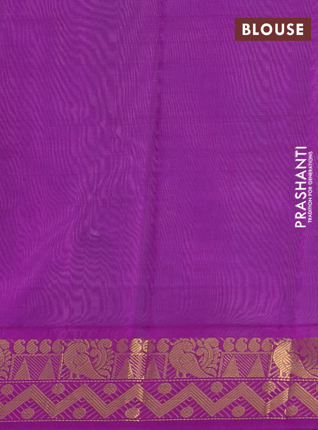 Silk cotton saree teal shade and purple with plain body and zari woven border