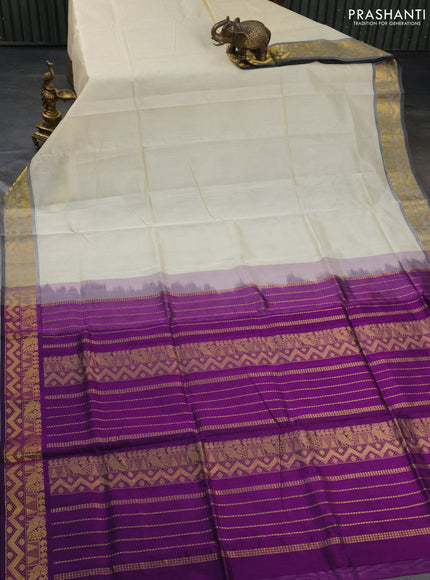 Silk cotton saree cream and purple with plain body and zari woven border