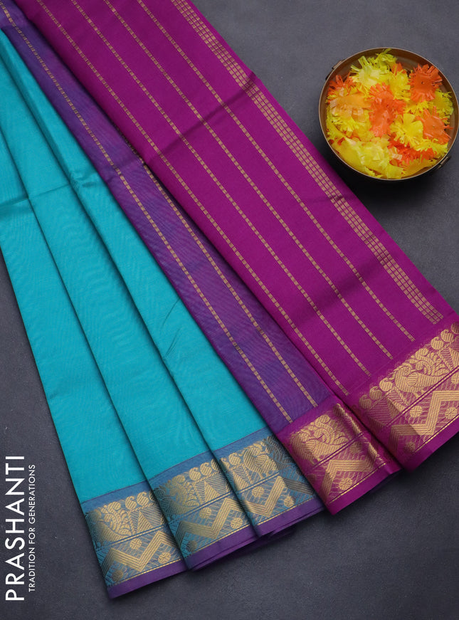Silk cotton saree teal blue and purple with plain body and zari woven border