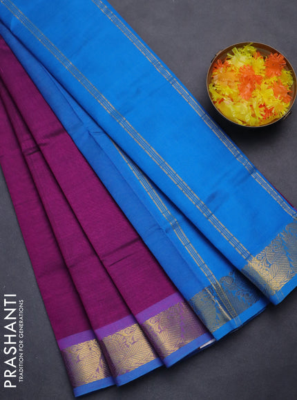 Silk cotton saree purple and cs blue with plain body and zari woven border