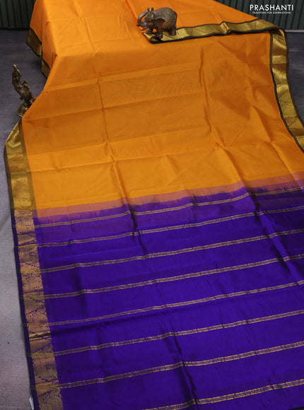 Silk cotton saree mango yellow and blue with plain body and zari woven border