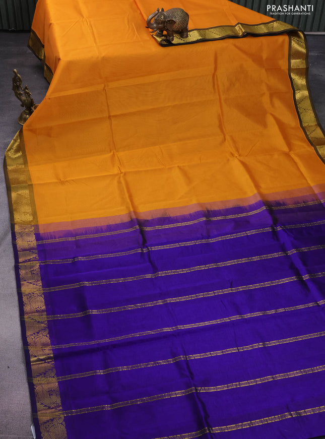 Silk cotton saree mango yellow and blue with plain body and zari woven border