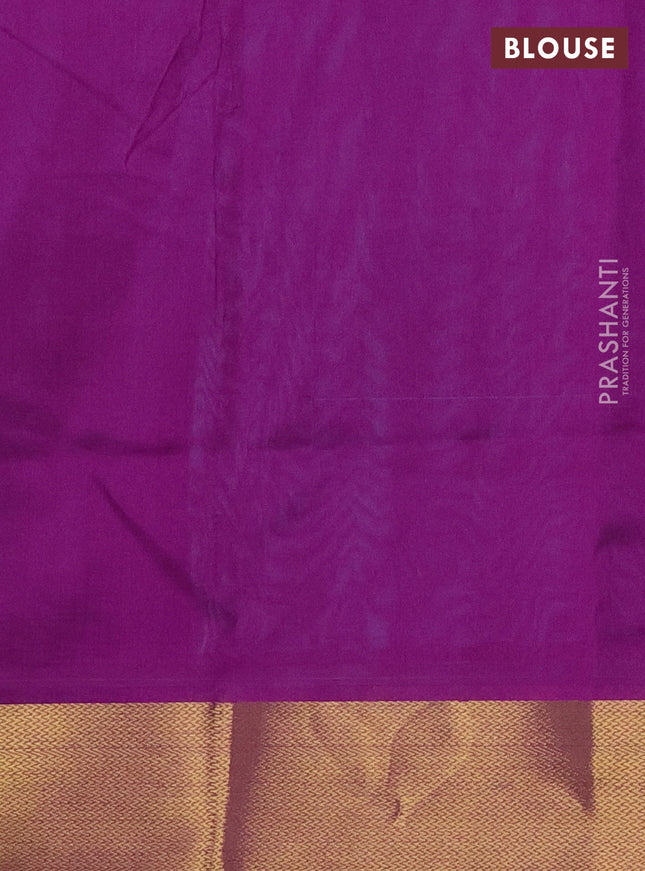 Silk cotton saree teal blue and purple with plain body and zari woven border