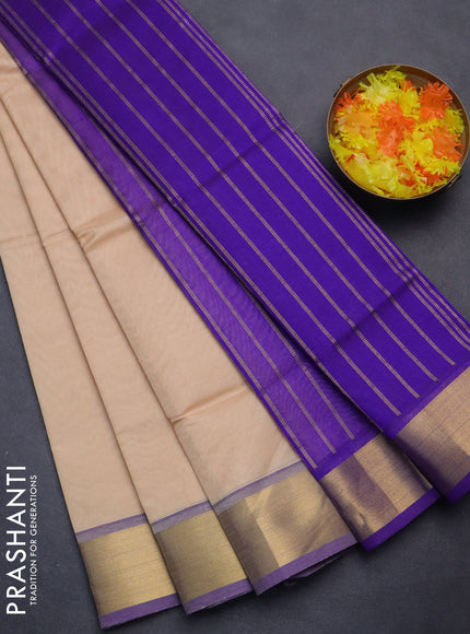 Silk cotton saree sandal and blue with plain body and zari woven border