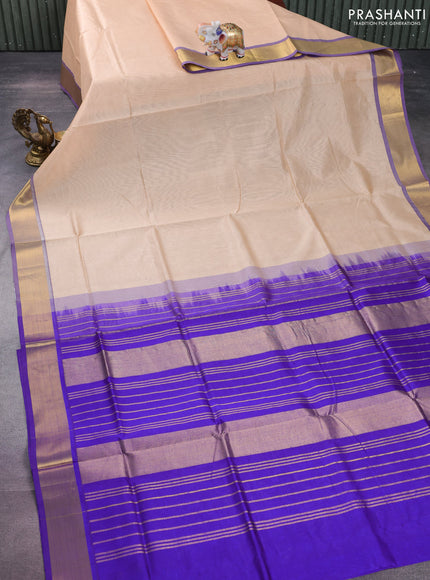 Silk cotton saree sandal and blue with plain body and zari woven border