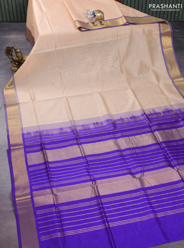 Silk cotton saree sandal and blue with plain body and zari woven border