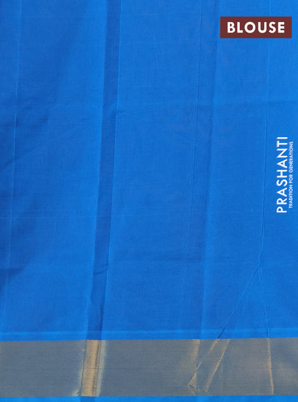 Silk cotton saree maroon and cs blue with plain body and zari woven border