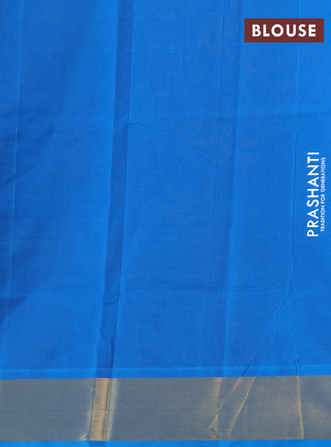 Silk cotton saree maroon and cs blue with plain body and zari woven border