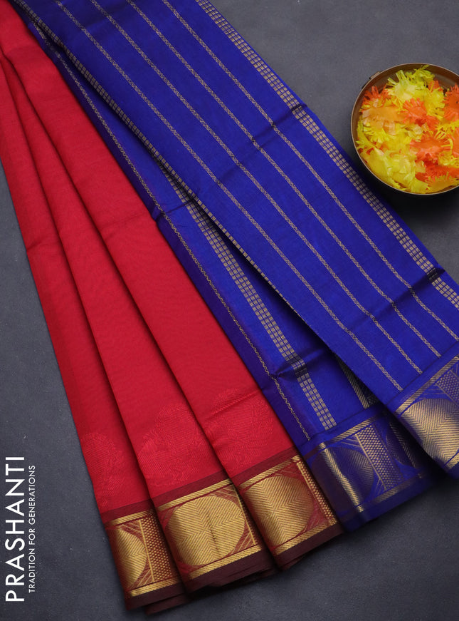 Silk cotton saree reddish pink and blue with plain body and rudhraksha zari woven border