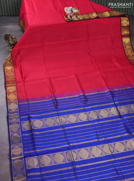 Silk cotton saree reddish pink and blue with plain body and rudhraksha zari woven border