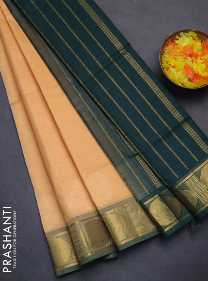 Silk cotton saree pale orange and green with plain body and rudhraksha zari woven border