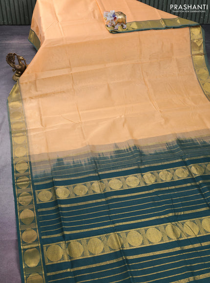 Silk cotton saree pale orange and green with plain body and rudhraksha zari woven border