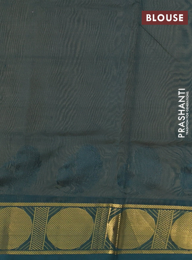 Silk cotton saree pale orange and green with plain body and rudhraksha zari woven border