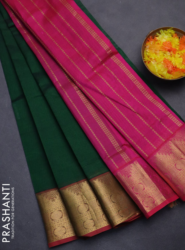 Silk cotton saree green and pink with plain body and zari woven border