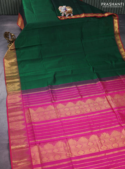 Silk cotton saree green and pink with plain body and zari woven border