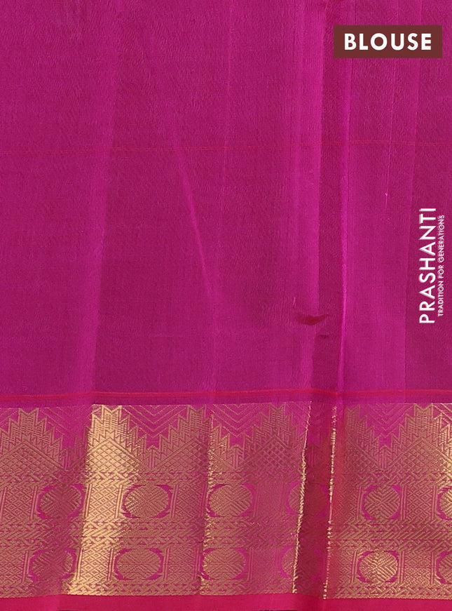 Silk cotton saree green and pink with plain body and zari woven border