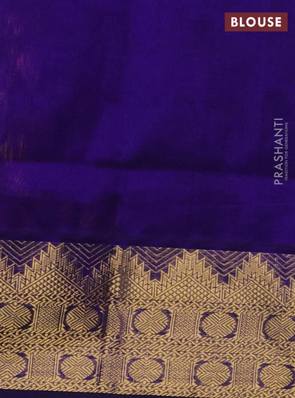 Silk cotton saree orange and blue with plain body and zari woven border