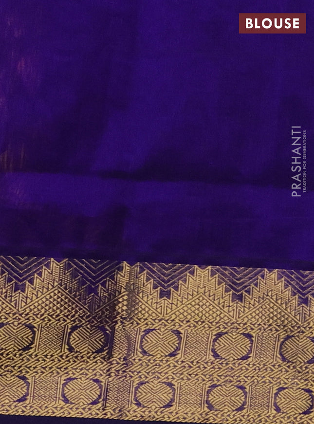 Silk cotton saree orange and blue with plain body and zari woven border