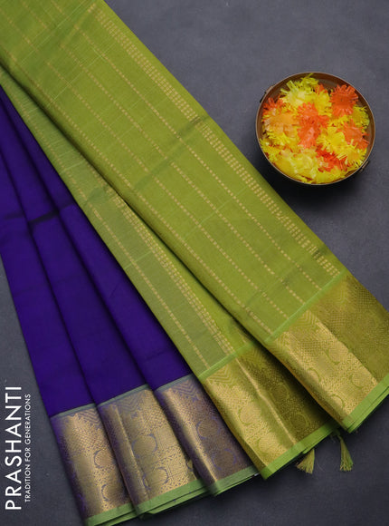 Silk cotton saree blue and light green with plain body and zari woven border