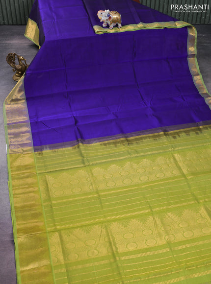 Silk cotton saree blue and light green with plain body and zari woven border