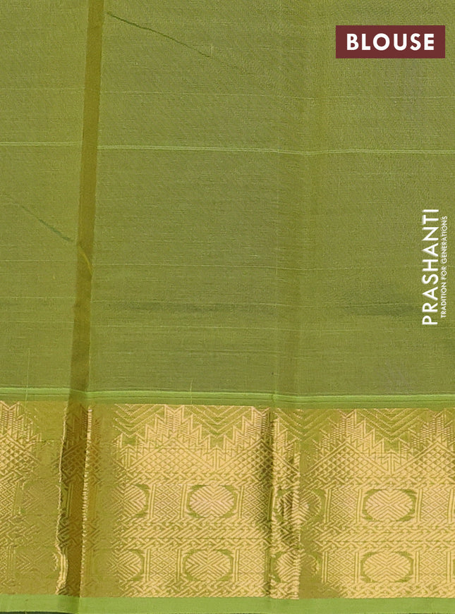 Silk cotton saree blue and light green with plain body and zari woven border