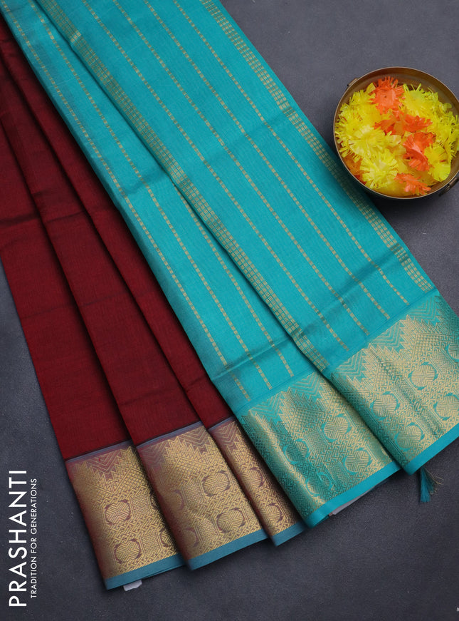 Silk cotton saree maroon and teal blue with plain body and zari woven border