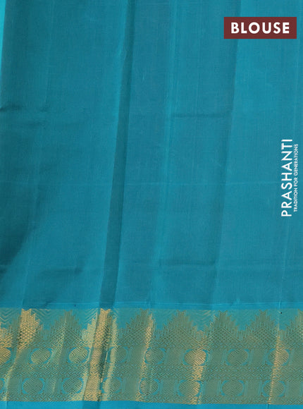 Silk cotton saree maroon and teal blue with plain body and zari woven border