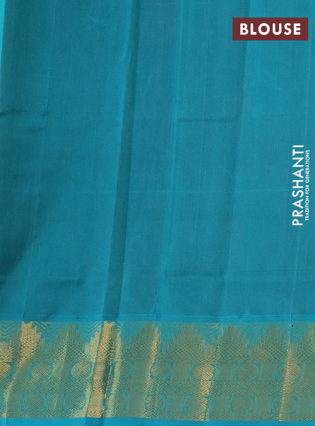 Silk cotton saree maroon and teal blue with plain body and zari woven border