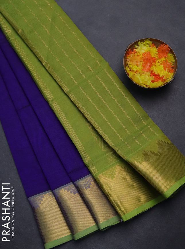 Silk cotton saree blue and light green with plain body and zari woven border