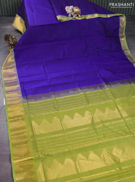 Silk cotton saree blue and light green with plain body and zari woven border