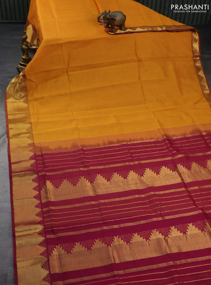 Silk cotton saree mustard yellow and maroon with plain body and zari woven border