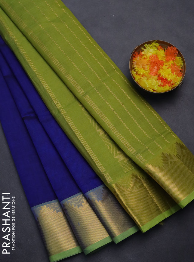 Silk cotton saree blue and light green with plain body and zari woven border