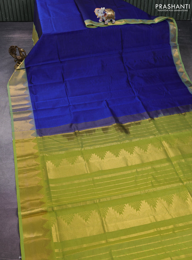 Silk cotton saree blue and light green with plain body and zari woven border