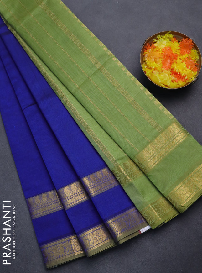 Silk cotton saree blue and pastel green with plain body and rettapet zari woven border
