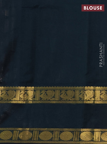 Silk cotton saree pale orange and black with plain body and rettapet zari woven border