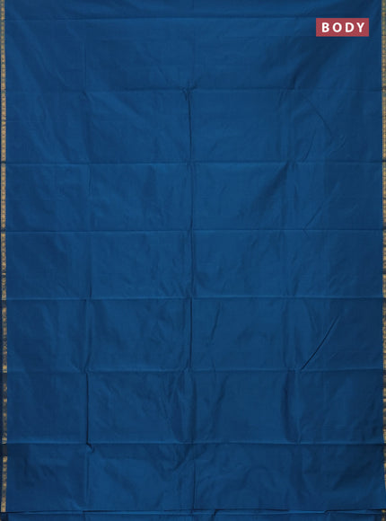 Arani semi silk saree peacock blue with plain body and small zari woven border