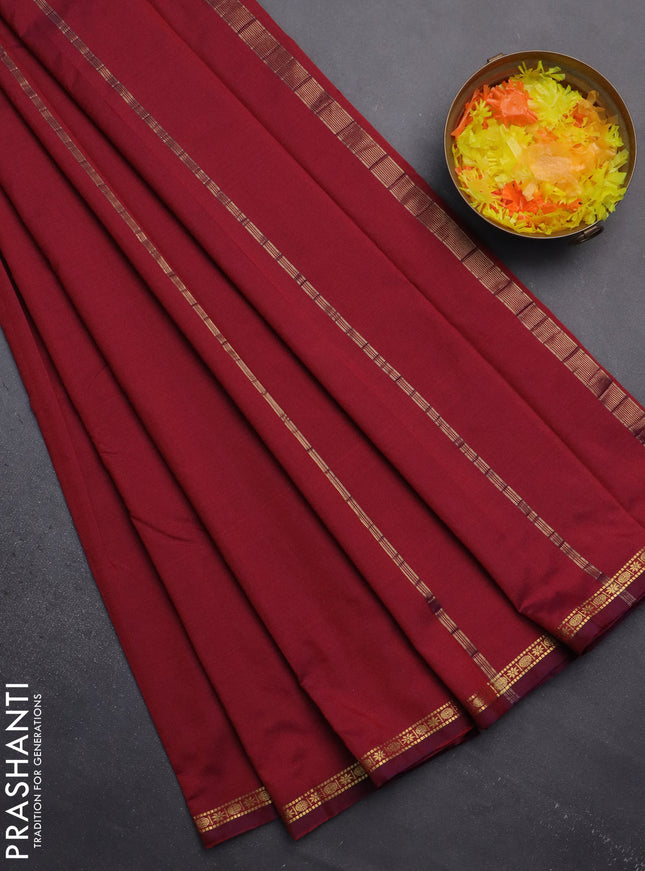 Arani semi silk saree dual shade of maroon with plain body and small zari woven border