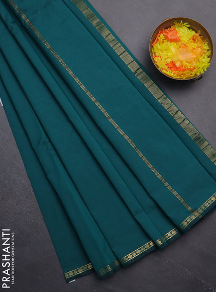 Arani semi silk saree peacock green with plain body and small zari woven border