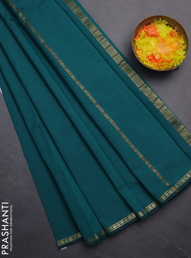Arani semi silk saree peacock green with plain body and small zari woven border